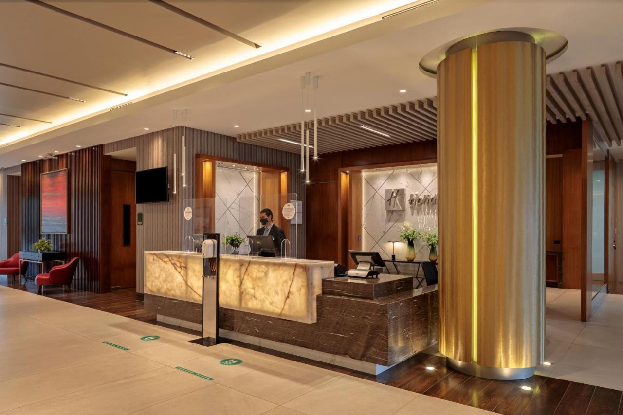 ฮอลิเดย์ อินน์ กีโต แอร์พอร์ต ตาบาเบลา ภายนอก รูปภาพ The lobby of the hotel